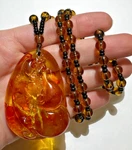 Handmade Golden Honey Carved Amber 3D Bird Baby Bead Pendant Necklace. Fixed Price $82.79.