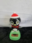 Solar Dancing - Eye Blinking Penguin Greenbrier International. Fixed Price $5.00.