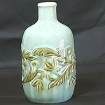 Vintage Porcelain Jar Green W'leaves Around Middle Made India 7-1/2" Preowned. Fixed Price $12.50.