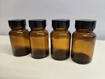 Four Empty Brown Amber Glass Bottles 1 Oz Capacity. Fixed Price $19.97.