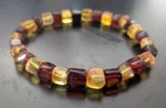 7" Cube Shaped Genuine Baltic Amber Honey & Cherry Red Stretch Bracelet. Fixed Price $36.99.